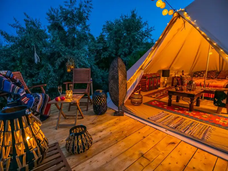 Evening view with Indian glamping tent.