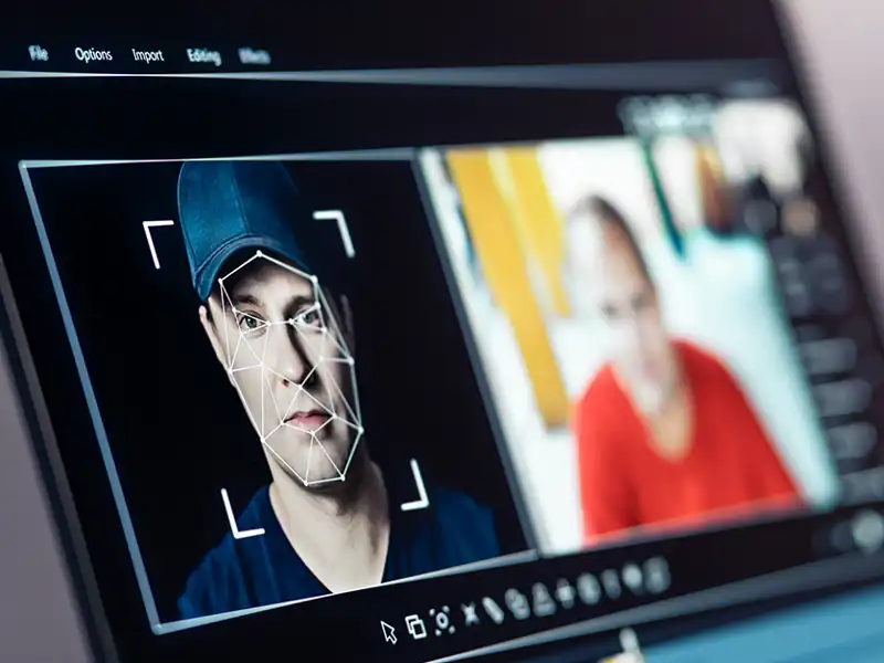Close up of a screen using facial recognition