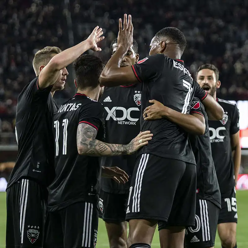 D.C. United players high fiving