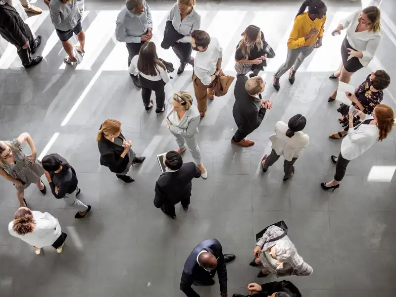Overhead view of business people at an event.